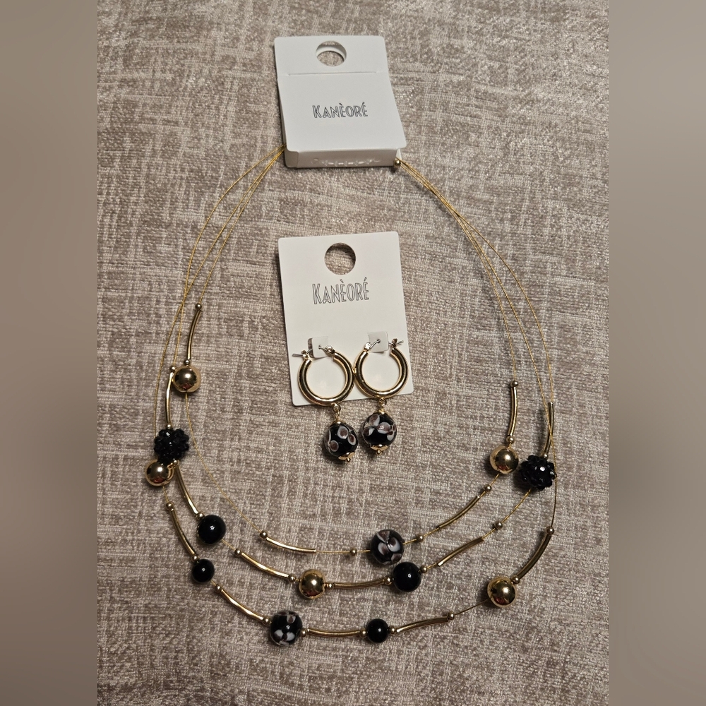 Gold and black beaded necklace and earring‎ set